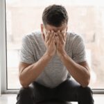 Young slim woman enjoys weight loss result